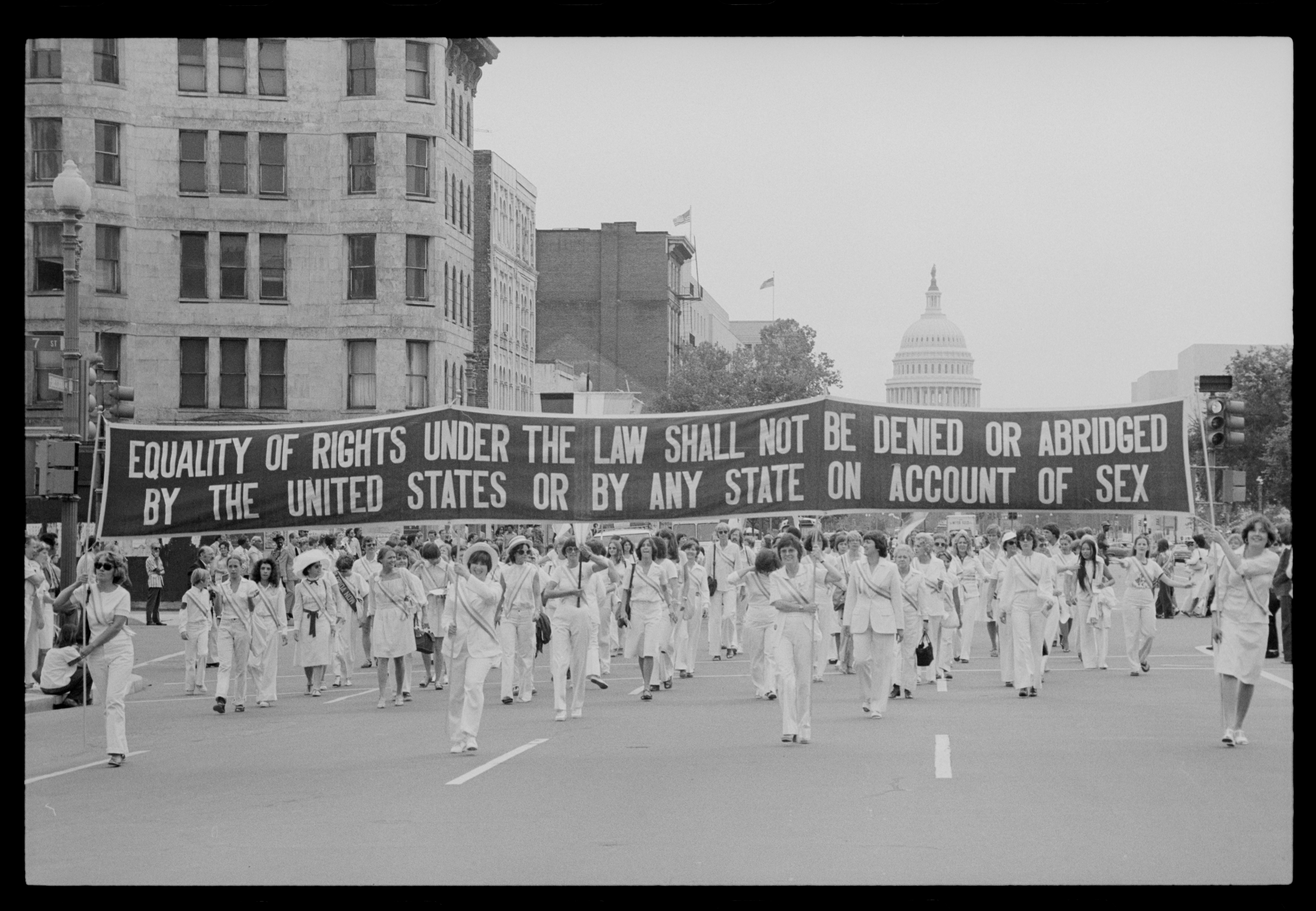 Activists marching in the Women's Equal Rights Parade on August 26, 1977