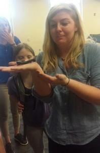 A millipede from the Blank Park Zoo visits the library.