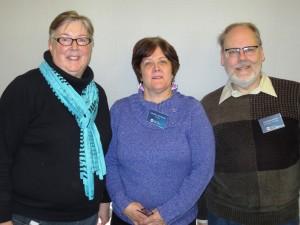 Valeria Schnor, middle, was recently honored for 40 years of service with the Iowa City Public Library. She is congratulated by Library Director Susan Craig, left, and Library Board of Trustees Member Thomas Dean.