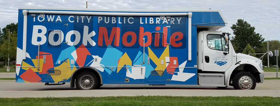 Bookmobile parked at the Farmer's Market