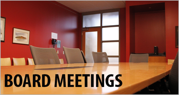 red meeting space with chairs and a table