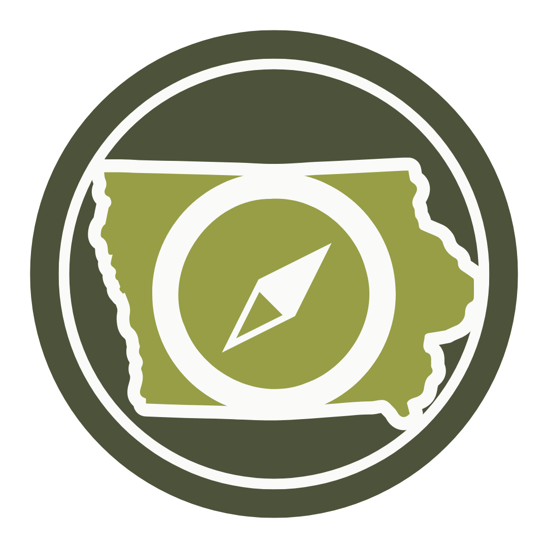 Green state of Iowa silhouette with compass in the center
