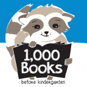 cartoon raccoon holding a sign that reads 1,000 Books Before Kindergarten