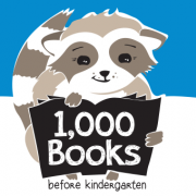 1000 Books cartoon raccoon holding a sign that reads 1,000 Books Before Kindergarten